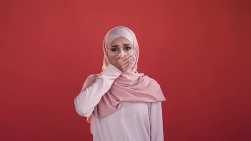 Sad Young Woman Wearing Pale Pink Hijab