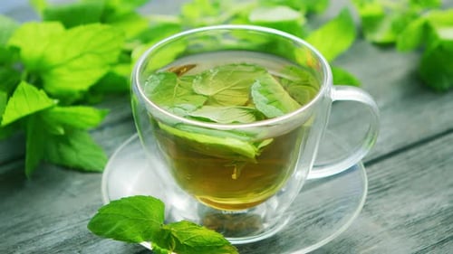 Cup of Green Tea with Mint and Lemon
