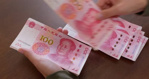 Hand Counting Chinese Renminbi Currency Notes