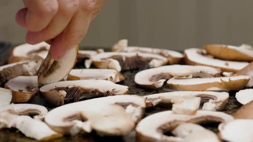 Champignon Mushrooms Are Fried On Grill