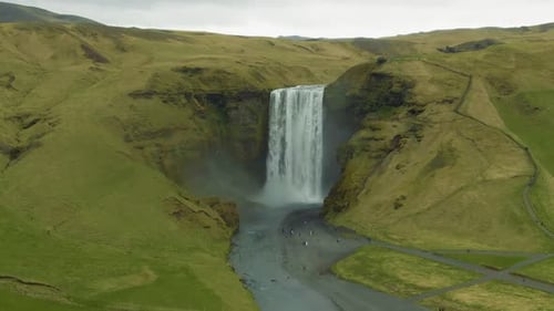 Skogafoss Waterfall and Green Landscape. Iceland. Aerial View