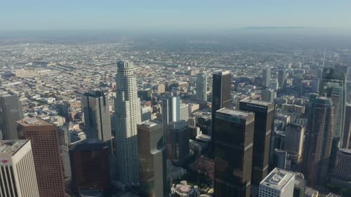 AERIAL: Wide View of Downtown Los Angeles, California Skyline at Beautiful Blue Sky and Sunny Day