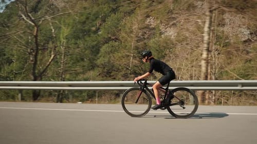 Woman cycling road bicycle