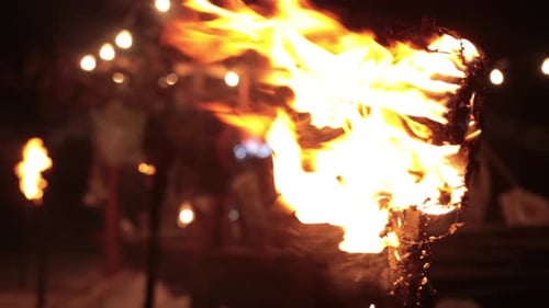 Close-up of a Burning Torch at Night
