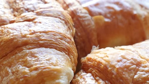 French croissant tasty dough roll arranged 4K 2160p 30fps UltraHD footage - Viennoiserie buttery Vi