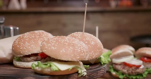 Burgers Smooth Rotation on a Wooden Stand
