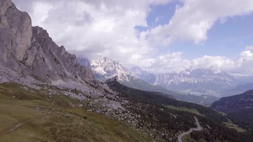 Aerial Flight Above Mountain Top in Sunny Day