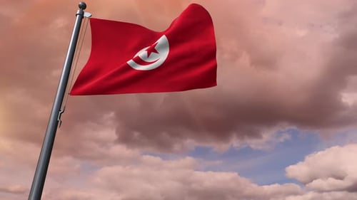 Waving Flag of Tunisia Against a Cloudy Sunset Sky
