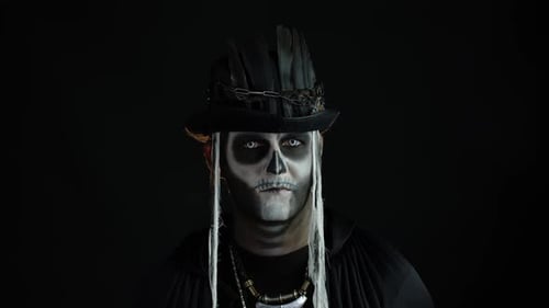 Man in Skeleton Makeup with Black Hat