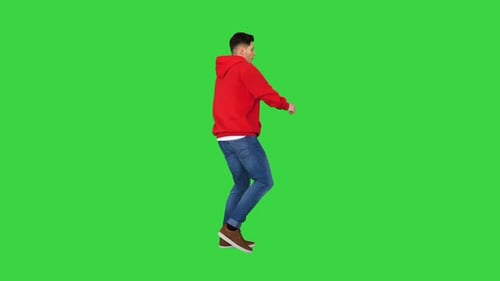 Young Hip-hop Man Break Dancing Top Break Dance on a Green Screen, Chroma Key.