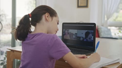 Child Engaged in Online Learning at Home