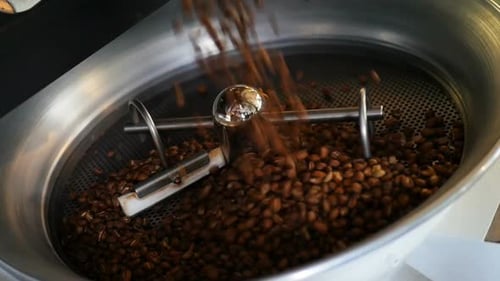 Roasted Coffee Beans Being Poured Into Mixer