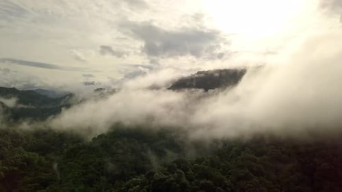 Aerial View Flying Thru Cloud Covered Mountain 05