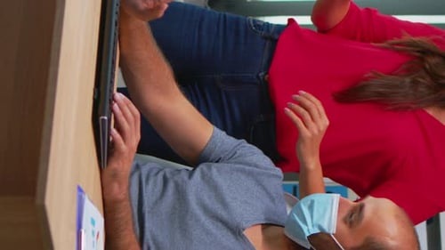 Vertical Video: Wearing Face Mask in New Normal Office