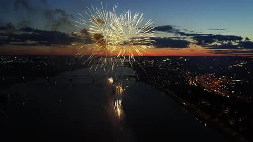 Aerial Colorful Fireworks in Night City Sky Bright Holiday Celebrations Party