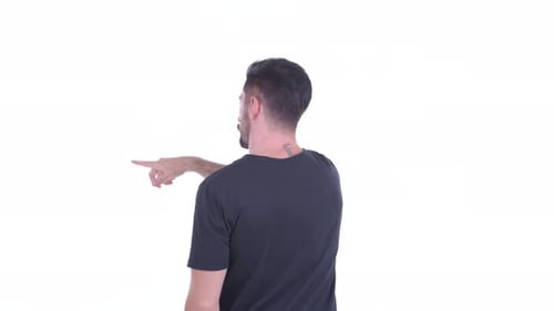 Rear View of Young Bearded Man Touching Something