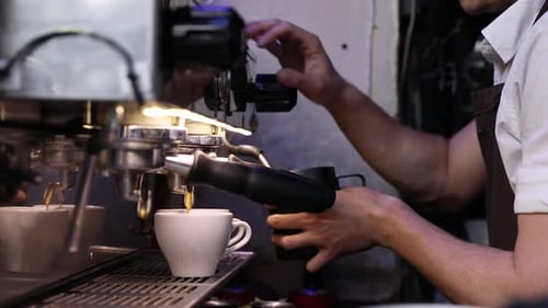 Barista Preparing Coffee On Coffee Machine At Cafe Closeup