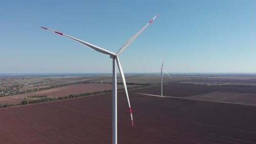 Wind turbines from aerial drone view. Windmills farm for energy production.
