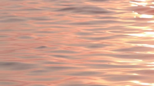 orange reflecting sunlight on the sea