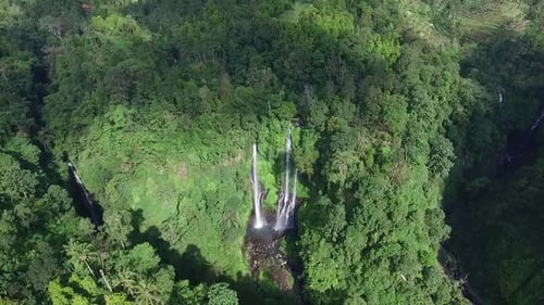 Aerial View of Waterfall in Green Rainforest