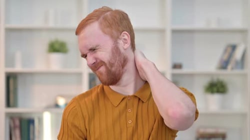 Adult Man Experiencing Neck Pain