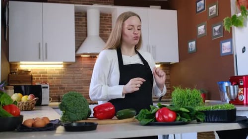Woman Preparing Microgreens in Sunny Kitchen