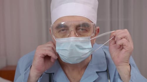 Extreme Close Up Portrait of Doctor Wearing Protective Medical Mask