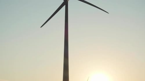 Wind generators at sunset