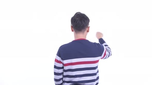 Rear View of Japanese Hipster Man Touching Something