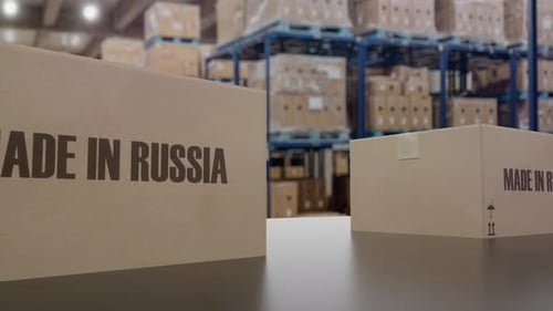 Boxes with MADE IN RUSSIA Text on Conveyor