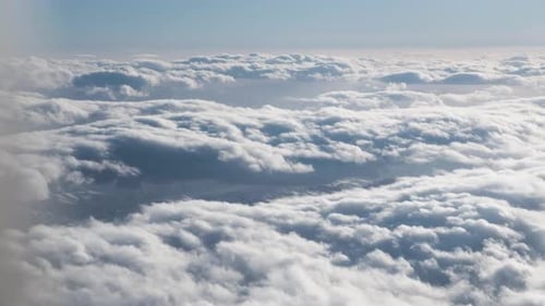 Aerial View of White Clouds Against Blue Sky