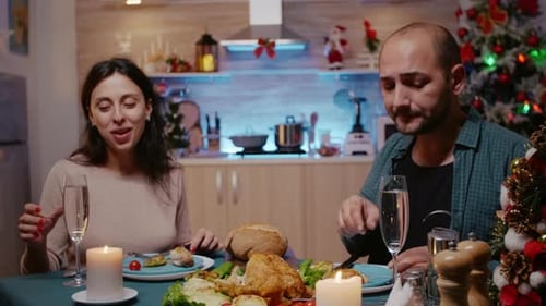 Couple Celebrating Christmas at Home Together