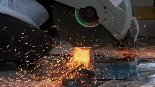 Metal Chop Saw Cutting Metal with Sparks