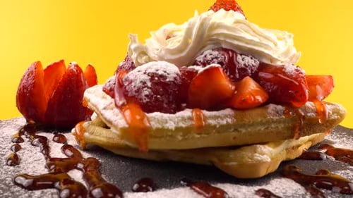 Delicious Waffles with Strawberries and Cream