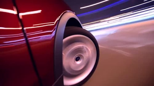 Car Driving Fast at Night