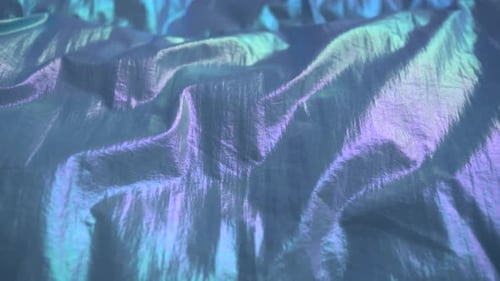 Iridescent Fabric Shimmering with Color and Light