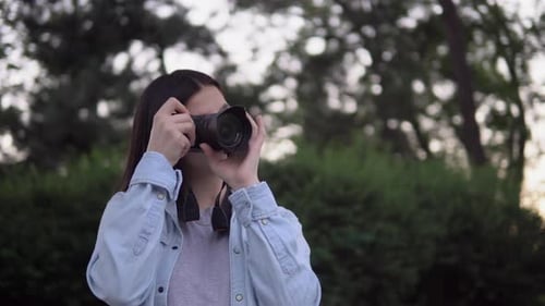 Attractiwe Woman Photographer Working with Model Street Photo Shoot Freelancer