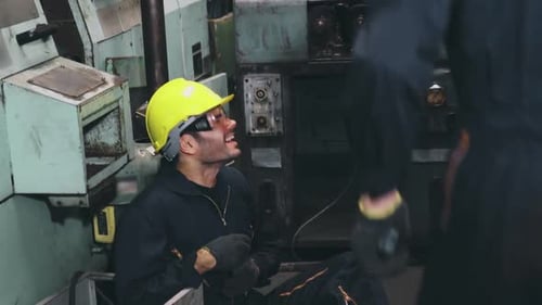Factory Worker Injured By Accident While Using Machine in Factory