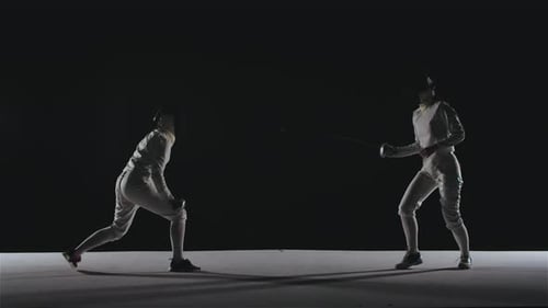 Silhouettes of Two Duel Fencers in White Suits. Mastery in Foil Fencing. Sports Lifestyle Concept