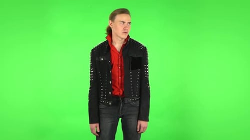 Guy Looking at the Camera with Excitement, Then Celebrating His Victory Triumph. Green Screen