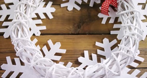 Holiday Wreath on Wood with Festive Bow