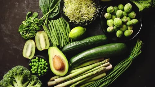 Green Healthy Food Composition with Avocado, Broccoli, Apple, Smoothie...