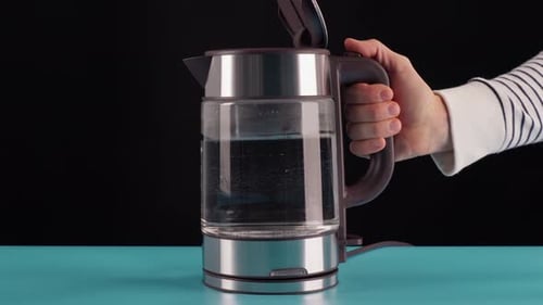 Hand Positions Modern Glass and Steel Electric Kettle