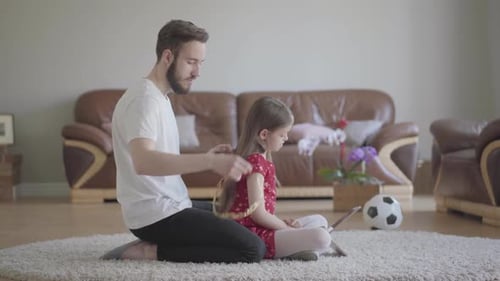 Dad Braids Daughter's Hair and Puts on Crown