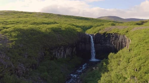 Flying Above the Svartifoss Waterfall in Vatnajokull National Park, Iceland