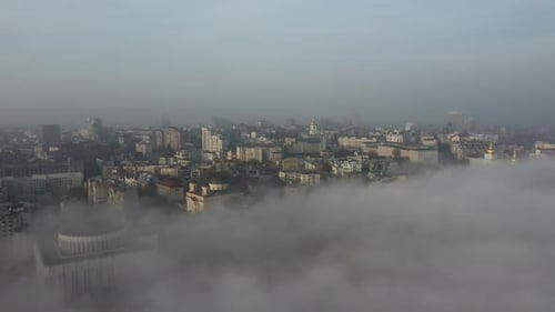 Aerial View of the City in the Fog