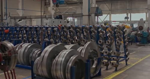 Metal Coils are in the Factory Floor Closeup