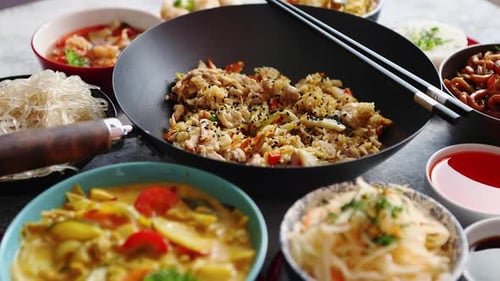 Asian Oriental Food Composition in Colorful Dishware