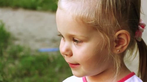 Positive Emotional Little Girl With Sweet Smile
