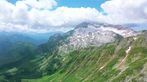 Aerial View of Valley Among Beautiful Mountains of Caucasus, Stunning Gorge Covered with Green Grass